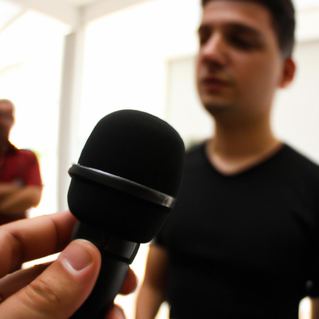 Person conducting interviews, holding microphone